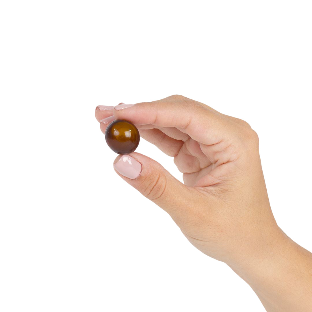 Aceite de masaje con bolitas brasileñas de chocolate