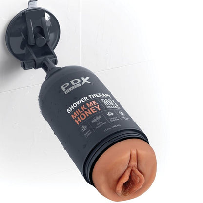 Pdx plus - masturbatore stroker dal design discreto con flacone di shampoo milk me honey candy